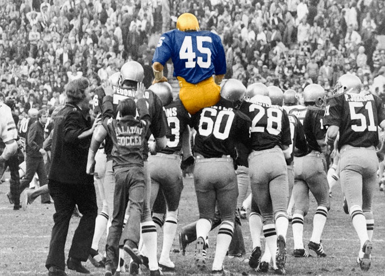 Rudy, wearing number 45, carried off the field by his Notre Dame teammates in 1975